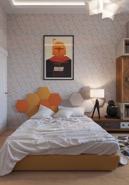 Cabeceira hexagonal laranja e branco com quadro (foto: Revista Viva Decora)